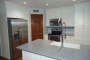 White and gray upgraded kitchen with crown moulding in AZ