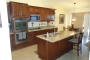 Side view Scottsdale remodeled kitchen by Valcon General Contractors
