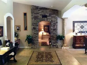 stone incorporated with accent wall walk way
